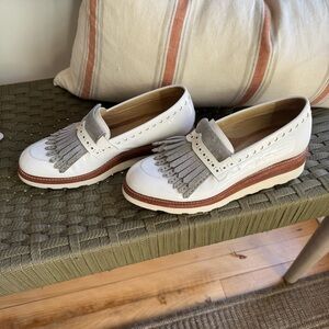 The Office of Angela Scott Mr. Pennywise White Metallic Fringe Wedge Loafer